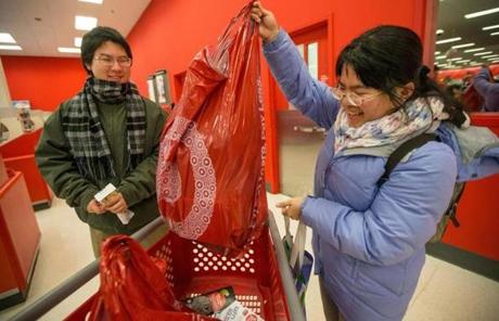 Mark Ting, 16, and Jenni Ting, 19, loaded up their cart after Target opened the doors to customers. 
