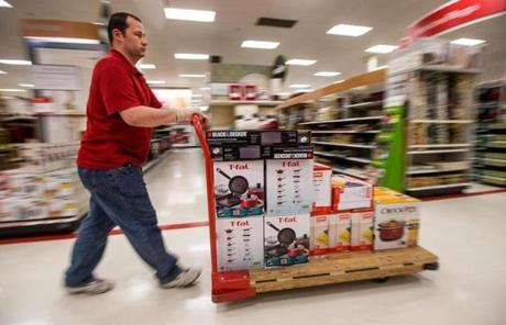 As shoppers piled items into their carts and baskets, Jake Yearley restocked the displays. 
