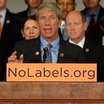 No Labels held a photo session in October for a group of Republican and Democratic lawmakers calling for an end to the government shutdown. 