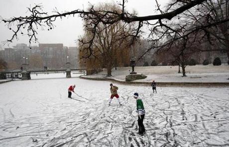Several New England residents played hockey on the frozen pond in Boston's Public Garden.
