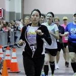 Runners took to the track during the half-marathon at the DCU Center in Worcester on Saturday.