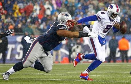 The Bills' Thad Lewis fumbled the ball while being run down by Sealver Siliga.
