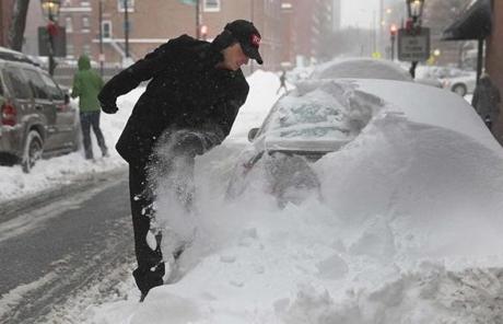  Jordan Mauro cleared off his car on Garden Street in Beacon Hill early Friday.
