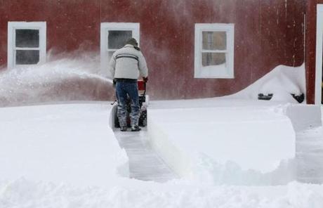 A snowblower cleared a path in Ipswich.
