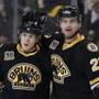 Torey Krug, left, celebrated his goal with Daniel Paille during the second period. (AP Photo/Michael Dwyer)