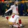 Phil Dawson kicked a field goal in the first quarter against the Packers. He went on to kick the game-winning field goal for the 49ers to edge Green Bay in their wild-card playoff game.