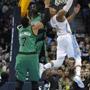 Nuggets guard Randy Foye scored over Jared Sullinger, left, and Brandon Bass in the first half.