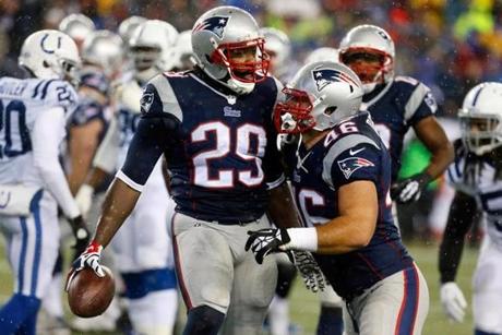 LeGarrette Blount scored three touchdowns in the first half of the game. With his fourth, he set a postseason team record.
