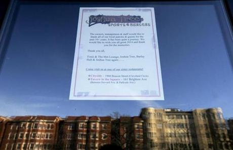 A note on the door of the Joshua Tree restaurant in Allston alerted customers to its closing.
