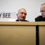 The Vatican's UN Ambassador Monsignor Silvano Tomasi (left) spoke with former Vatican Chief Prosecutor of Clerical Sexual Abuse Charles Scicluna prior to the start of a questioning over clerical sexual abuse of children at the headquarters of the United Nations High Commissioner for Human Rights on Thursday.