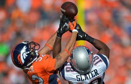 Broncos cornerback Tony Carter broke up a pass intended for Matthew Slater.
