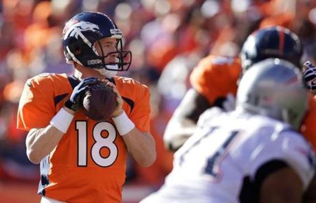 Peyton Manning looked for a receiver in the first quarter.
