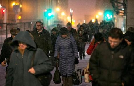 Snow is expected to continue falling into Wednesday, snarling the morning commute.
