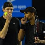 Eric Butorac (left) and doubles partner Raven Klaasen communicated during a break in the Australian Open men’s doubles final match on Saturday.