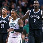 In the final seconds of Brooklyn’s victory, Kevin Garnett pats the head of former teammate Rajon Rondo. Another ex-Rondo teammate and current Net, Paul Pierce, is at left.