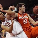Ryan Anderson  and Virginia Tech forward Christian Beyer tangled in the second half. 