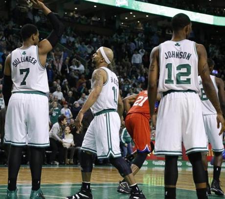 Jared Sullinger, Jerryd Bayless, and Chris Johnson were dejected after the buzzer-beater.
