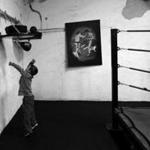 Six-year-old Andrew Honohan tries out the speed bag at one of Peter Welch’s gyms in South Boston.