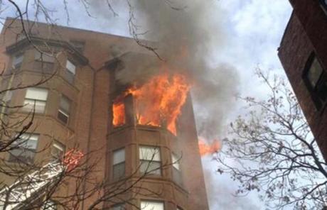 Flames could be seen from outside the Back Bay apartment building.
