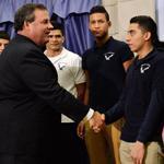 New Jersey Governor Chris Christie shakes students’ hands after a ceremonial signing of the DREAM Act last month.