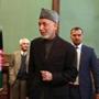 Afghan President Hamid Karzai, seen arriving for a press conference in Kabul on Jan. 25, has had clandestine contact with the Taliban that has had little effect.