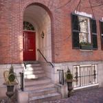 The rector’s condo has a two-car garage, pantry with a wine cellar, and a guesthouse, and it is near Boston Common.