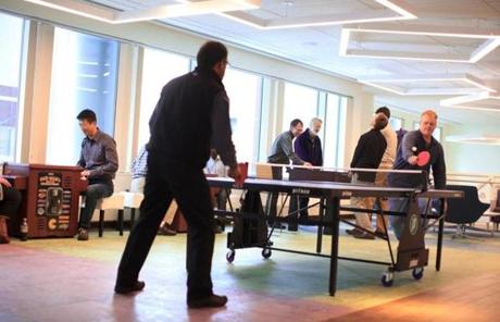 Vertex scientists Donald Hodges (right) and Malar Pannirselvam played a quick game of Ping-Pong during lunch.
