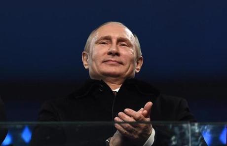 Russian President Vladimir Putin clapped during the Opening Ceremony.
