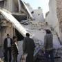 Residents in Aleppo, Syria, examined a site hit by what activists said was shelling from forces loyal to the government.
