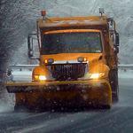 A truck plowed along Highway 75 near Helen, Ga., Tuesday. Sleet and freezing rain were expected overnight.