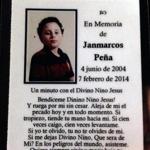 Cards with Janmarcos Pena’s photo and a prayer in Spanish were handed out at his wake.