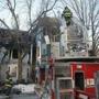 Firefighters responded to a three-alarm blaze in Cambridge on Wednesday that killed a woman.