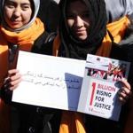 About 100 women marched in Kabul on Thursday to protest new legislation that legal experts said would curb prosecutions involving violence against women.
