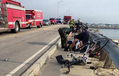 Emergency workers tended to a rider who was hurt when Hess drove into a group of bicyclists in Seabrook, around 8:30 a.m. Sept. 21.
