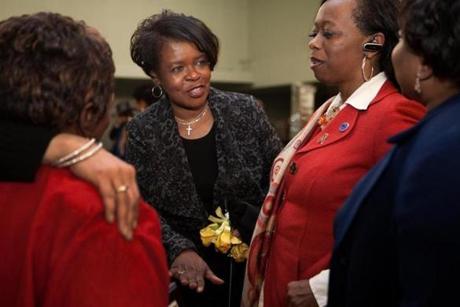 Dianne Wilkerson (second from left) with supporters Willie Mae Allen (left), Mary Tuitt, and Arian Allen.

