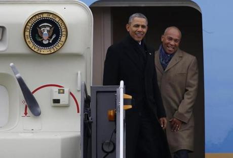 President Obama, accompanied by Governor Deval Patrick, arrived at Logan Airport on Air Force One on Wednesday.
