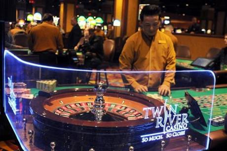 Twin River Casino has slot machines and table games such as roulette. The Plainridge slot parlor will not have table games.
