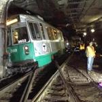 An MBTA Green Line trolley derailed and struck a wall near Kenmore Station on Monday.