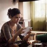 Nimrat Kaur (pictured) and Irrfan Khan play strangers who become involved through letters passed to each other in lunchboxes.