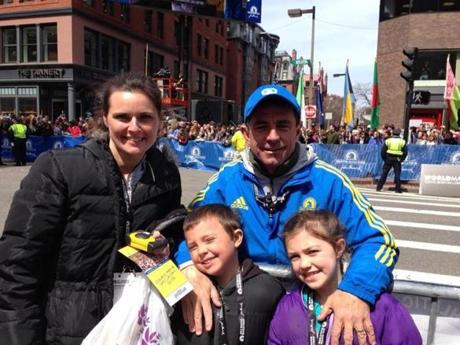 Dave McGillivray, his wife, Katie, and their children Luke and Elle, at the Marathon finish last year. This year McGillivray’s family won’t be attending the event with him.
