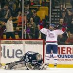 UMass-Lowell’s A.J. White celebrated a goal in front of dejected UNH goalie Casey DeSmith during the first period Saturday.