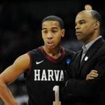 Harvard coach Tommy Amaker talked to Siyani Chambers in the first half of Saturday’s game against Michigan State.