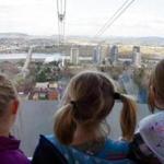 Ride the Portland Aerial Tram or observe how other families behave at the zoo. 