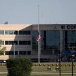 The American flag flew at half mast in front of III Corps Headquarters on Fort Hood Army Base. 