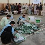 Afghan election officials counted ballots at the end of polling in Kandahar.