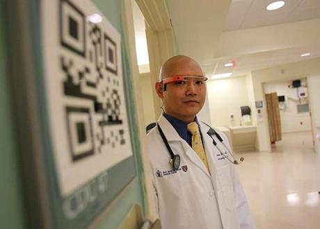 Dr. Steven Horng shows Google Glass that he and other doctors will use to read patient records.
