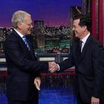 Stephen Colbert (right) will succeed David Letterman as host of CBS’s “Late Show” next year.