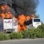 Massive flames engulfed a tractor-trailer and a tour bus just after they collided near Orland, Calif.