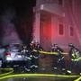 Boston firefighters are seen battling an eight-alarm blaze on Lexington Street on Wednesday.