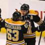 Brad Marchand congratulated Patrice Bergeron after Bergeron's goal in the second period.